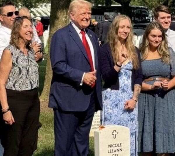 Trump thumbs up grave scaled