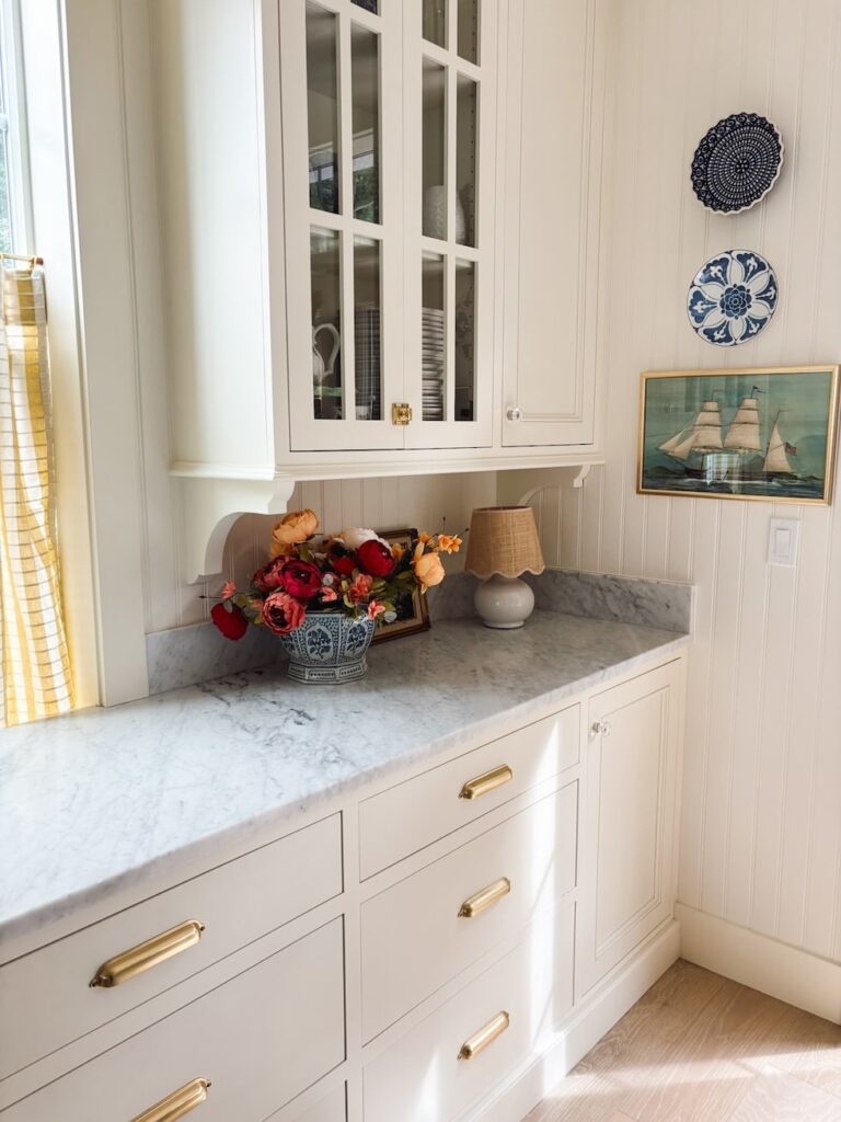 cottage kitchen corner glass cabinets plates hanging wall the inspired room